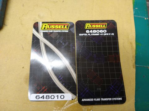 1996 Ford Bronco - Two packages of Russell Advanced Fluid Transfer Systems parts are displayed, showing part numbers 648010 and 648060.