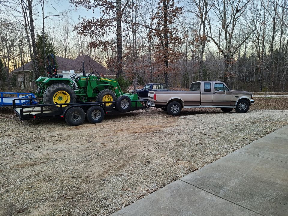This is ~5600# of truck pulling a ~3000# trailer with a ~7500# tractor on it for a total of ~16Kip GCW. It was obviously overweight when starting off, but surprisingly easy to steer & brake.