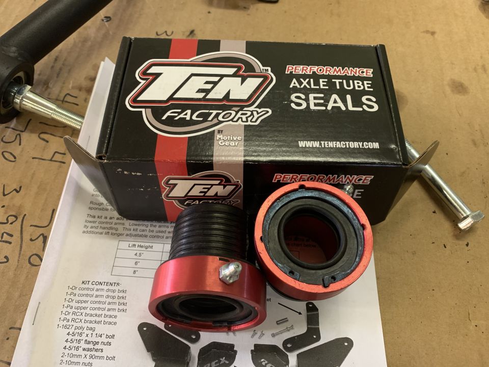 TEN Factory axle tube seals kit with instructions and hardware