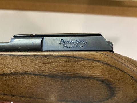 2011 Harley-Davidson Elec Gld Police - Remington Model Five rifle receiver detail with wooden stock.