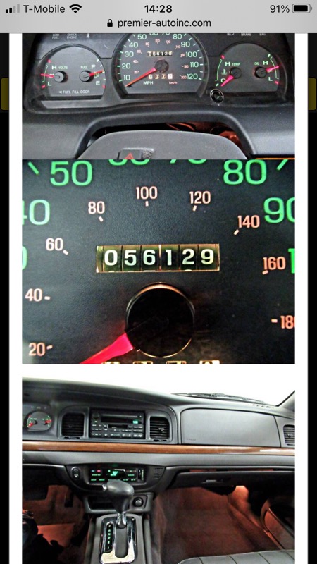 1995 Mercury Grand Marquis - Interior view of a car's dashboard and center console, displaying the odometer reading.