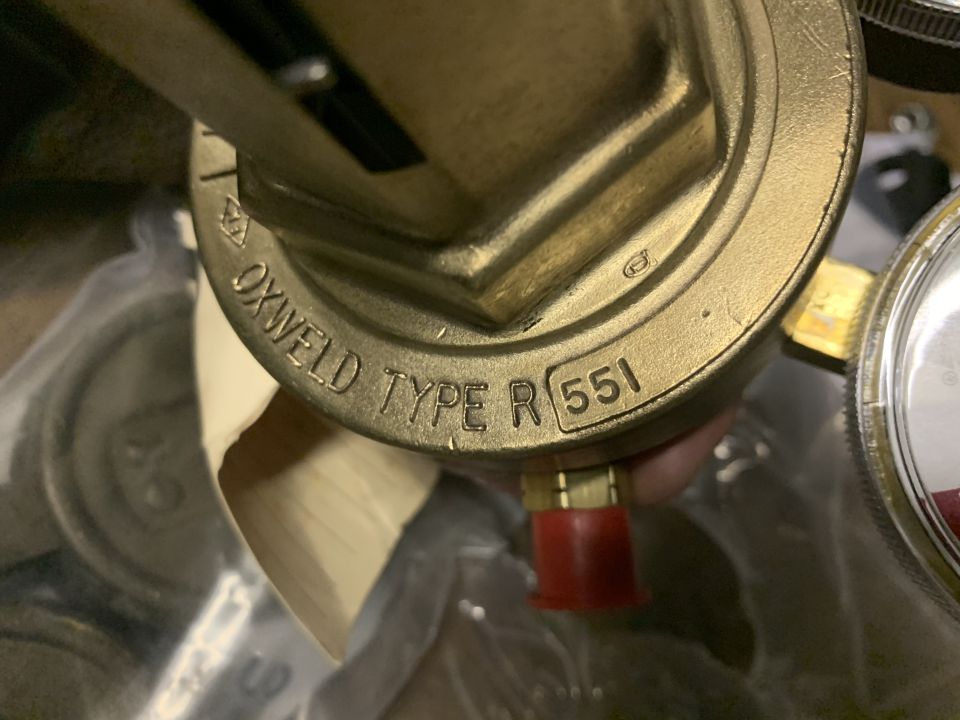 Brass oxy-acetylene regulator with "OXWELD TYPE R 551" stamped on its side