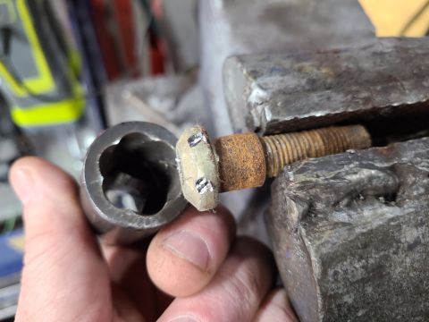 1995 Ford F-150 - This seat belt bolt was seized so badly that I broke 2 bits in it. But this spiral socket removed it easily.