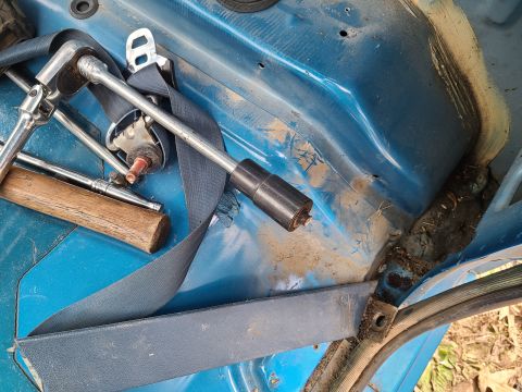 1995 Ford F-150 - This seat belt bolt was also seized, but its head came off. I haven't attempted to extract the rest of the bolt from the body. UPDATE: I go…