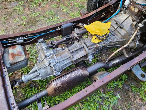 1995 Ford F-150 - After throwing the bed off, I pressure-washed the whole thing again. I'll probably put all the transmission-related parts (trans, clutch hy…