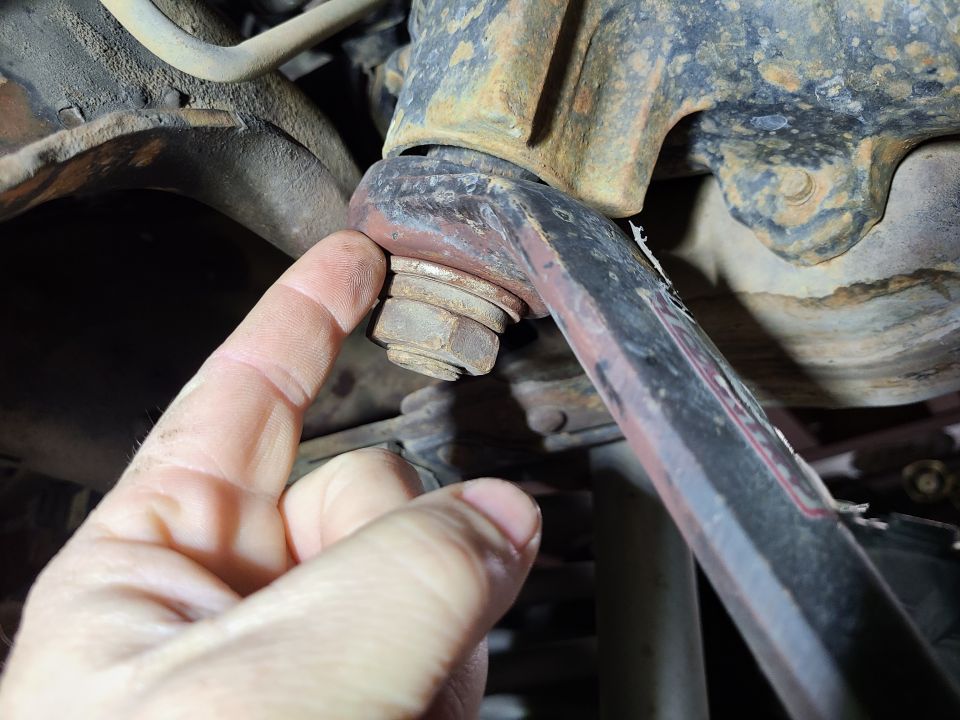 The pitman arm nut was found to be loose, so it was tightened to a few hundred ft-lbs.