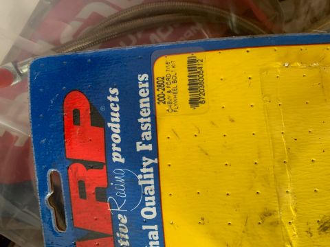1996 Ford Bronco - ARP flywheel bolt kit packaging for Chevy and Ford vehicles is visible.