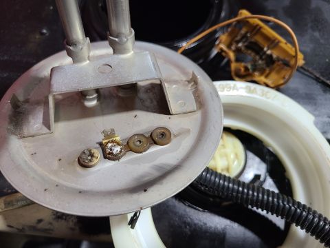 1997 Ford F-250 - The pass-through insulated rivet was fairly easy to repair by sandblasting & then soldering the inside terminal back on. IF THE IMAGE IS TO…