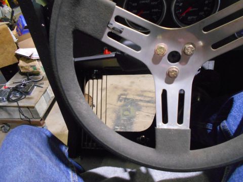 1992 Ford Bronco - The interior of a vehicle is shown, focusing on the steering wheel and dashboard gauges.