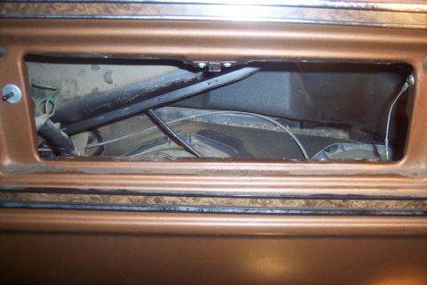 1978 Ford Bronco - Interior view of a 1978 Ford Bronco's dashboard, showing the heater core and associated components.