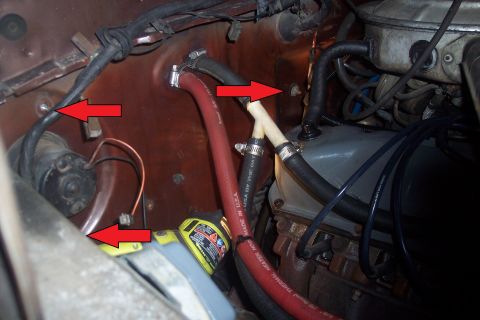 1978 Ford Bronco - Close-up view of engine bay components including hoses and wiring.