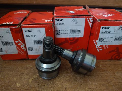 1996 Ford Bronco - TRW ball joints, part numbers JBJ7011 and JBJ882, are shown with their original packaging.