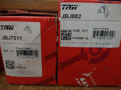 1996 Ford Bronco - Two boxes of TRW automotive parts are shown, each with product numbers and barcodes.