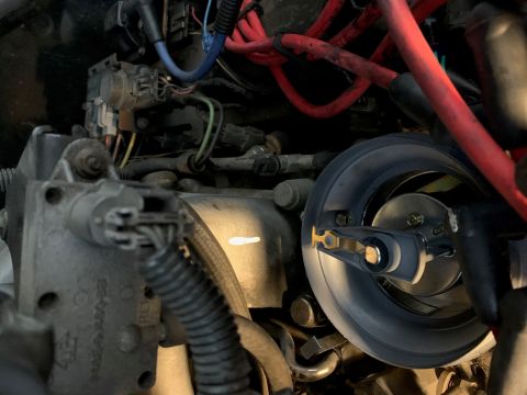1996 Ford Bronco - Engine compartment detail showing various mechanical and electrical components.