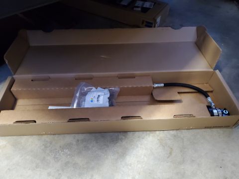 1996 Ford Bronco - A boxed automotive part, likely a hose assembly, is shown with visible branding.