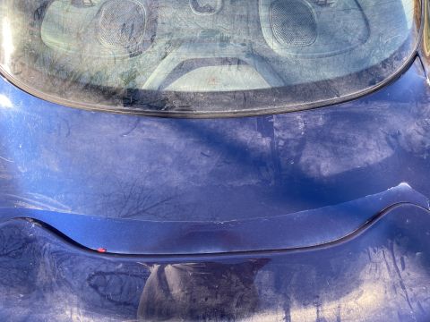 Blue 2000 Pontiac Grand Prix rear with visible interior through windshield