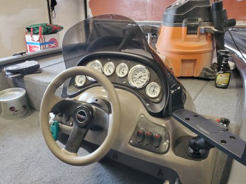 2005 Tracker Tournament - Interior view of a boat's helm, showing the steering wheel and instrument panel.