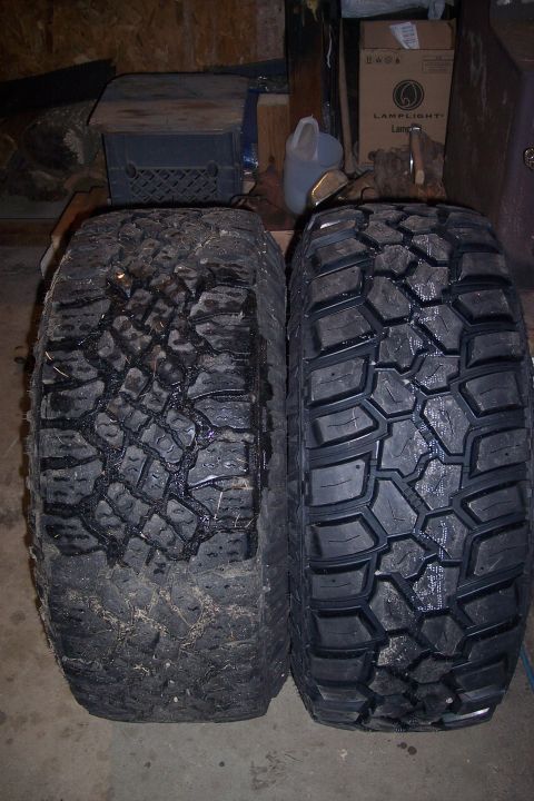 1978 Ford Bronco - Comparison of a worn off-road tire next to a new one.