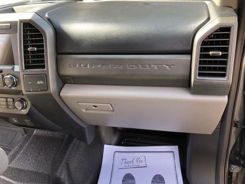2021 Ford F-250 - The "SUPER DUTY" designation is visible on the dashboard of this truck's interior.