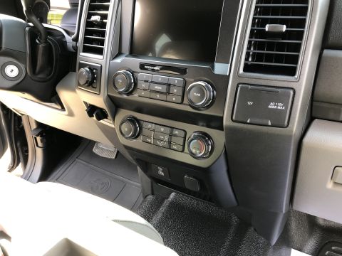2021 Ford F-250 - Interior view of a 2021 Ford F-250, highlighting the center console and dashboard.