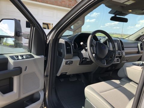 2021 Ford F-250 - Interior view of a 2021 Ford F-250, highlighting the dashboard and seating area.