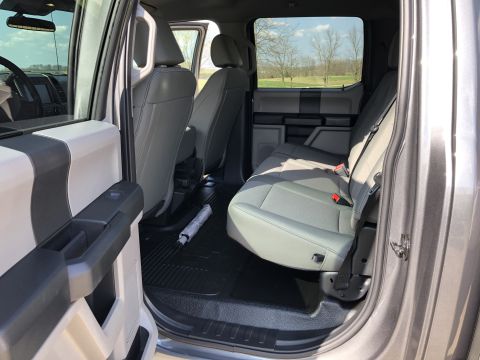2021 Ford F-250 - Interior view of a pickup truck, highlighting the rear seating area and door trim.