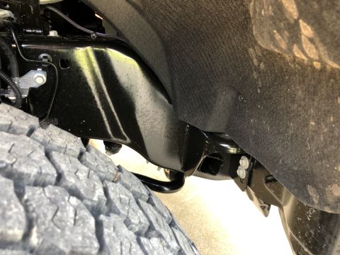 2021 Ford F-250 - Detail of the undercarriage and tire of a truck.