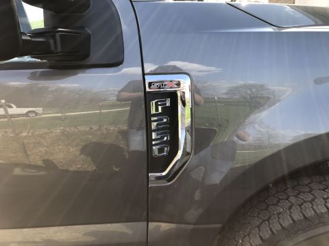 2021 Ford F-250 - Fender badge detail on a Ford F-250 truck.