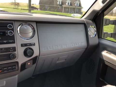 2011 Ford F-250 - Interior view of a 2011 Ford F-250 Super Duty, showing the dashboard and passenger side.