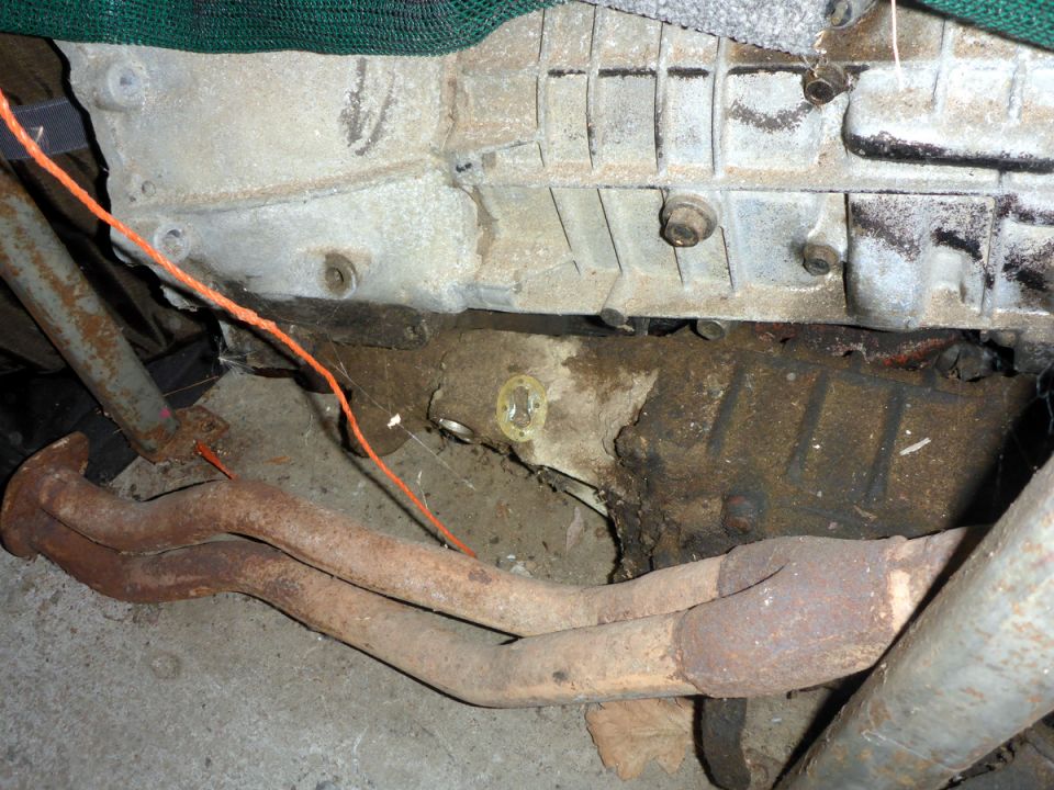 Engine block and rusty exhaust manifold