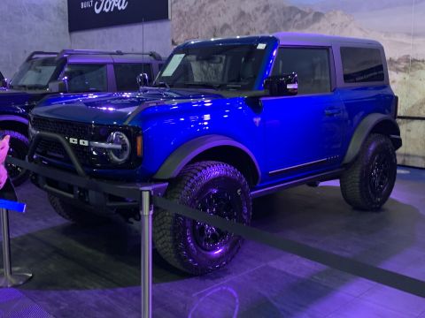 2021 Ford Bronco - Two-door 2021 Ford Bronco on display, with another Bronco visible in the background.