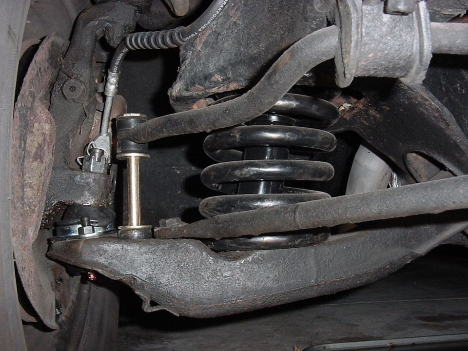 New Moog ball joint (lower) on passenger side. Bolt in type, NOT pressed in.