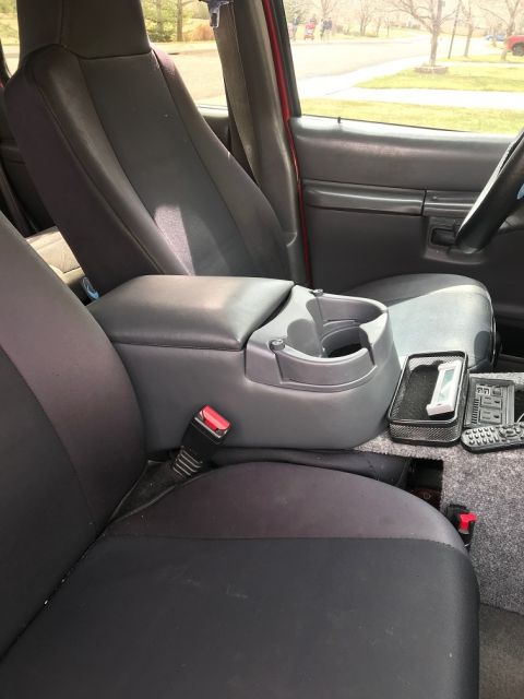 2000 Ford Explorer - Interior view of a 2000 Ford Explorer, highlighting the center console and seating area.