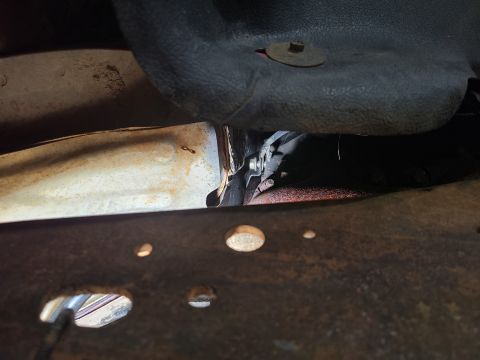 1997 Ford F-250 - Although I probably could have left it hanging here, I pulled the dipstick tube's 1 bolt. This & the middle bellhousing bolt on this side (…