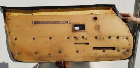 1973 Chevrolet Camaro - Interior car door panel, showing insulation and mounting points.