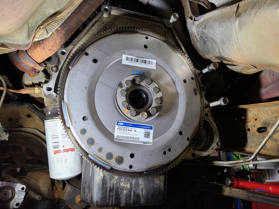 The [url=https://www.amazon.com/dp/B000O0K47A]new flexplate[/url] arrived, so I washed & clearcoated it before installation. The torque spec for the flexplate bolts is 23-39 lb-ft. Torque converter nuts are 25-34 lb-ft. Bellhousing to block is either 39-53 or 41-56 lb-ft depending which section of the manual you look in.
IF THE IMAGE IS TOO SMALL, click it.