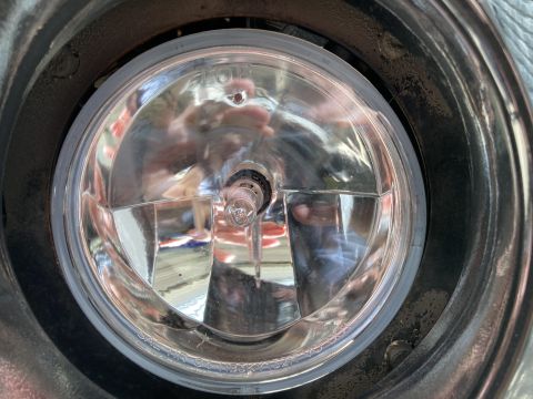 2015 Ford F-550 - A single fog light is shown, with reflections visible on its clear lens.