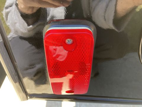 2015 Ford F-550 - Red trailer light with part number visible.