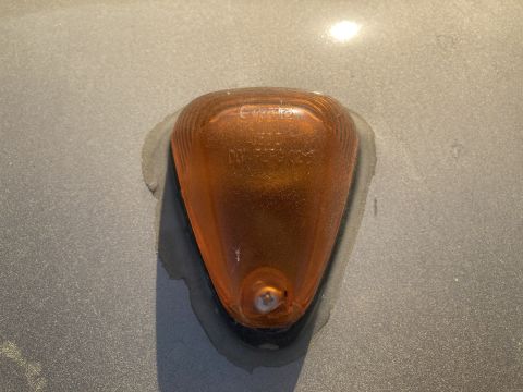 2015 Ford F-550 - Close-up of an amber marker light, showing 'Grote' and 'DOT SAE P2' markings.