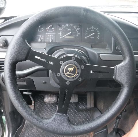 1992 Ford Bronco - Quick release steering wheel setup, to make it possible to climb over and get to the back without getting out. I'm not as limber as I used…