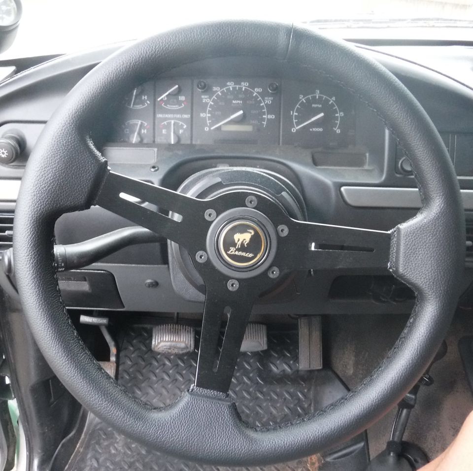 Quick release steering wheel setup, to make it possible to climb over and get to the back without getting out.  I'm not as limber as I used to be...