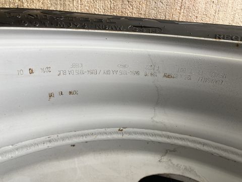 2015 Ford F-550 - Close-up of a wheel rim showing manufacturing date stamps.