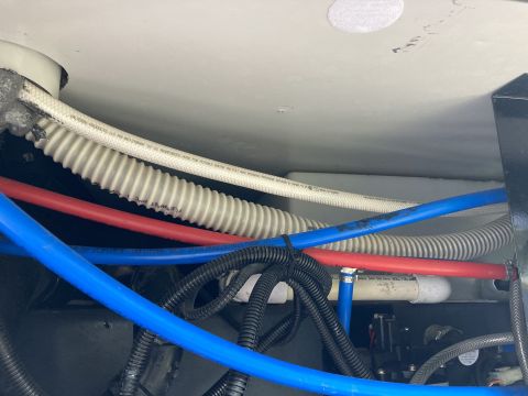 2015 Ford F-550 - Plumbing and wiring components are visible in this close-up view.