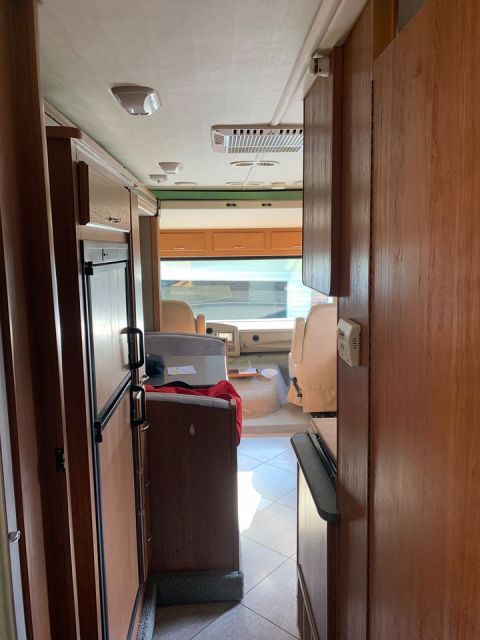 2015 Ford F-550 - This photo shows the interior of a recreational vehicle, looking towards the front cabin area.