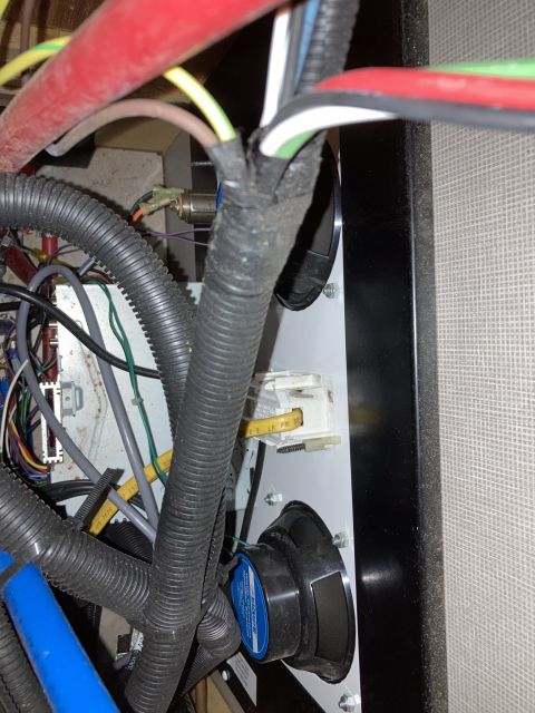 2015 Ford F-550 - A complex network of wires and electrical components is visible in this close-up view.