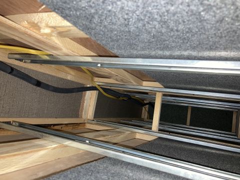 2015 Ford F-550 - View of the underside of cabinetry, showing construction and wiring, not a vehicle.