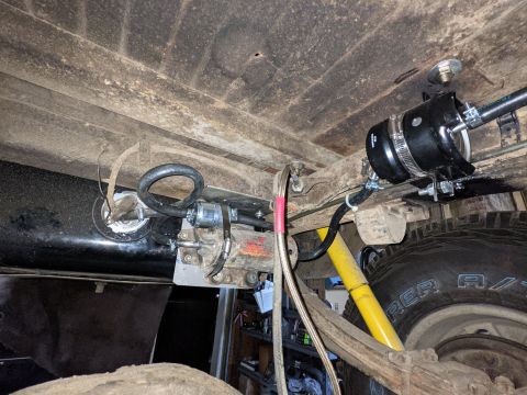 1973 Ford Bronco - Bosch 69100 fuel pump mounted low to feed off the carburetor style sending unit. WIX 33270 150 micron filter (screen) before the pump and G…