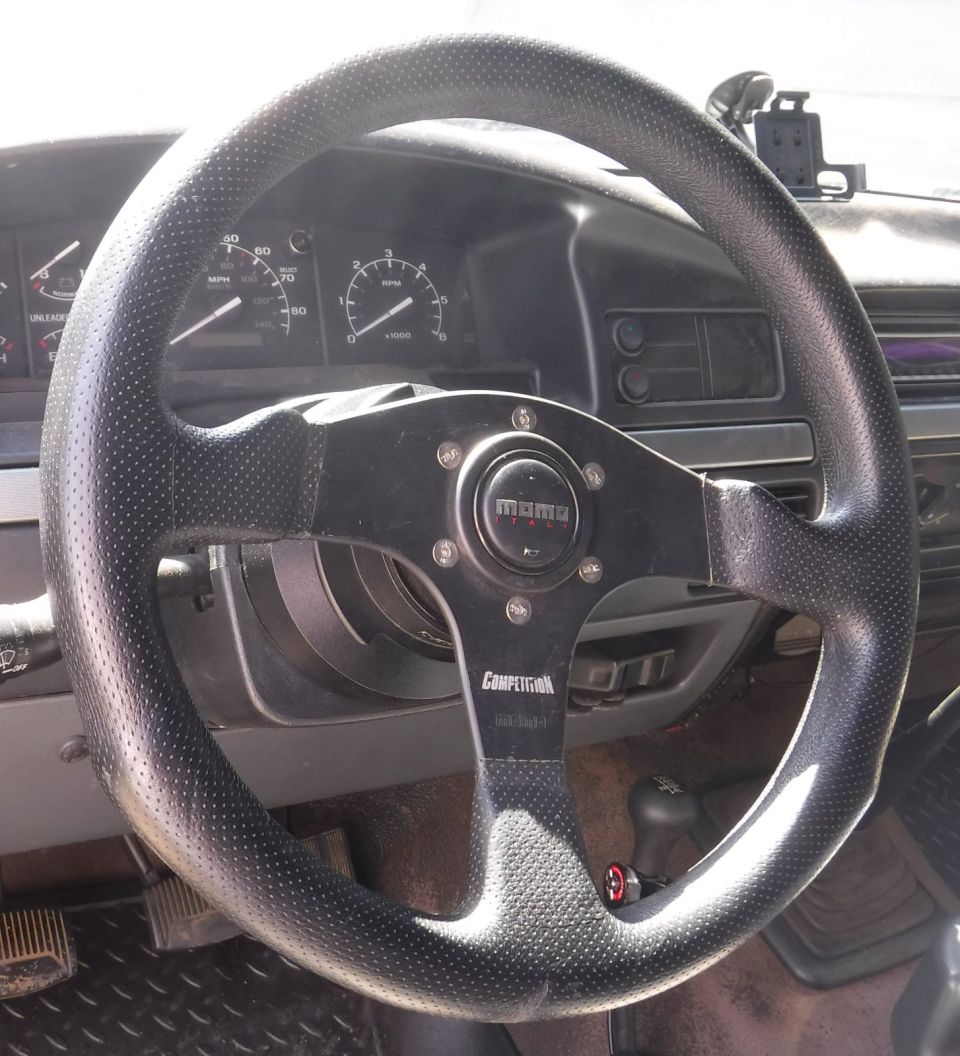 Found a too-good-to-pass-up alternate steering wheel with matching QR top half, days after settling on the previously pictured one.