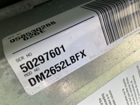 2015 Ford F-550 - Manufacturer data/spec plate listing model number DM2652LBFX, serial 50297601, and a barcode.