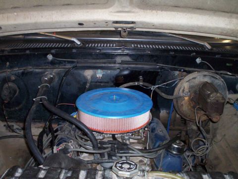 1978 Ford Bronco - View of the engine bay, a blue air filter and brake booster assembly.